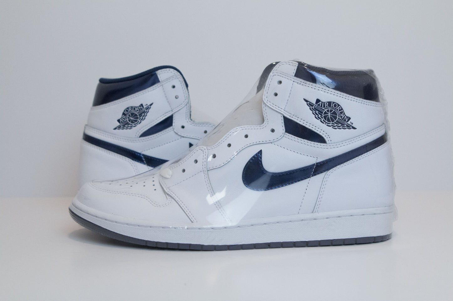 AJ1 METALLIC NAVY DS SIZE 12M