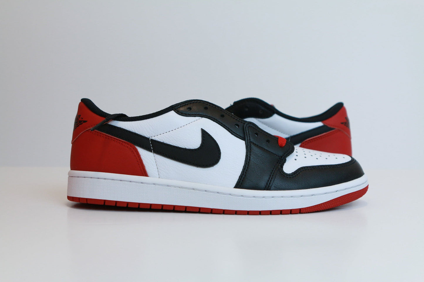 AJ1 LOW BLACK TOE DS