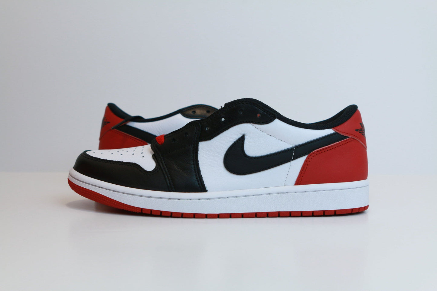AJ1 LOW BLACK TOE DS